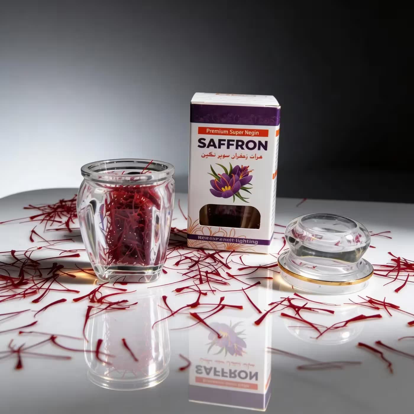 Desi Nectar Herat Super Negin saffron threads in a glass jar beside the box